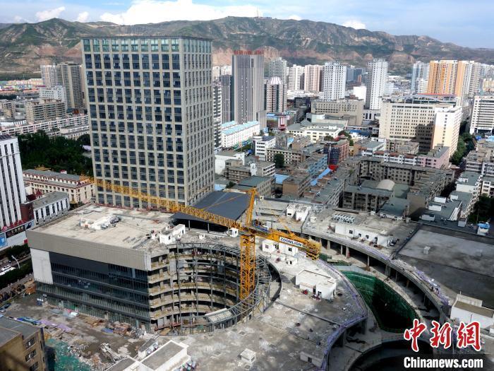 资料图:城中区某商品住宅楼。 孙睿 摄 资料图:城中区某商品住宅楼。 孙睿 摄